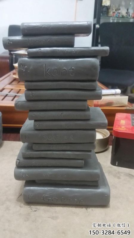 疊書雕塑提供，美陳雕塑，不銹鋼疊書雕塑制作廠家