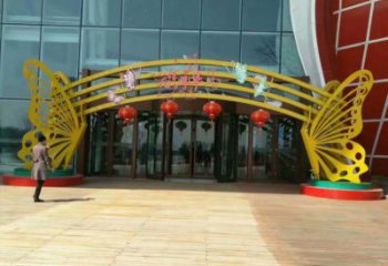 雅安蝴蝶拱門雕塑，鏤空烤漆效果，不銹鋼小區(qū)標識雕塑